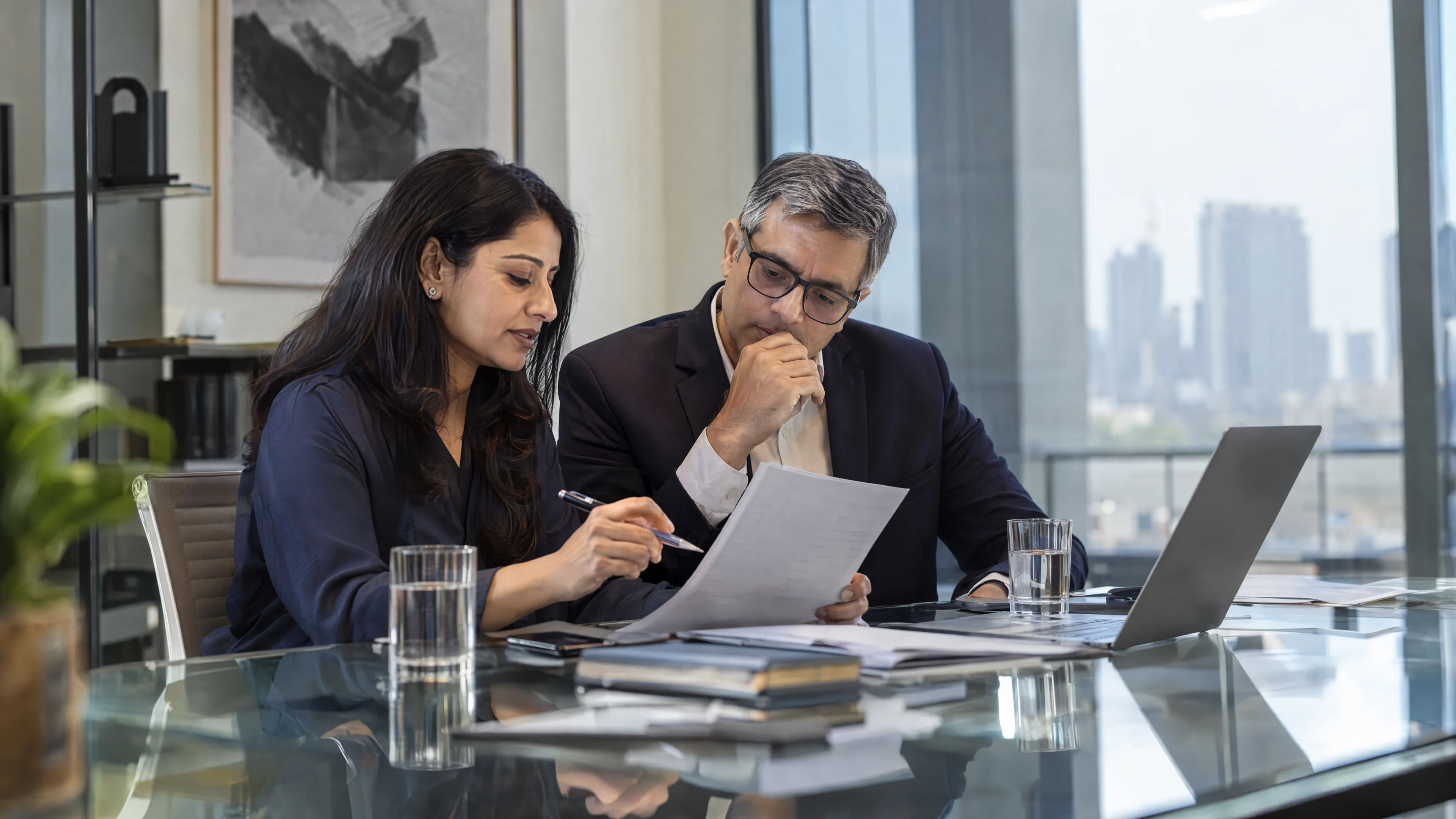 Governance specialist and department owner reviewing an access document.