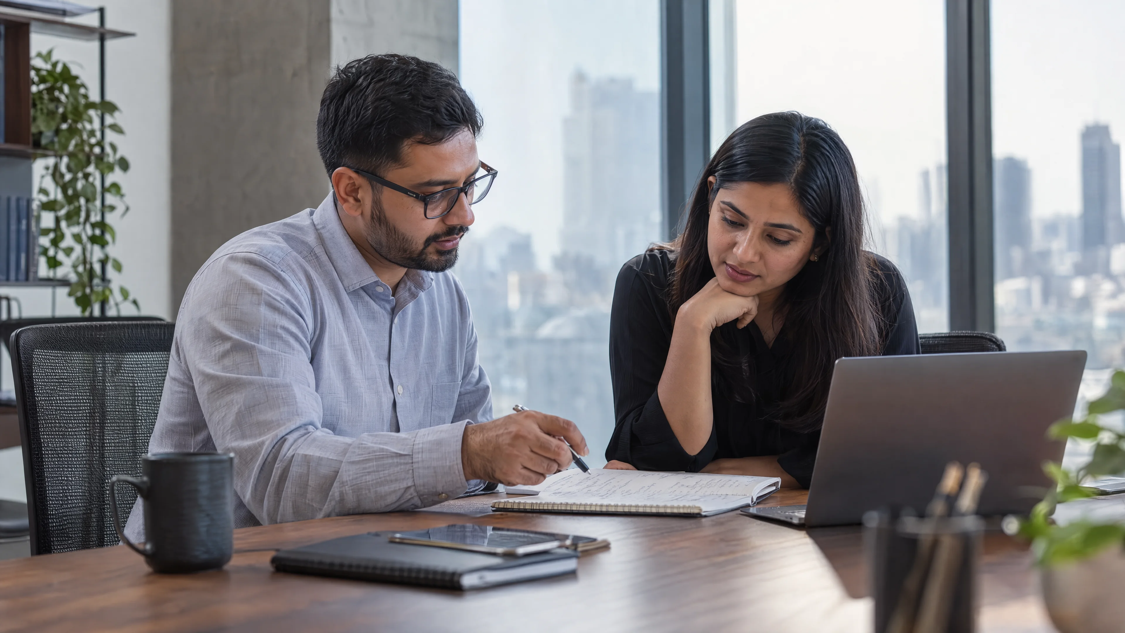 Commercial analyst and department specialist comparing metric definitions.